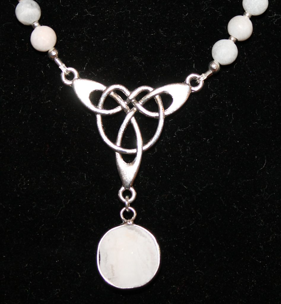 Grey Agate Celtic Knot Necklace | Hand 