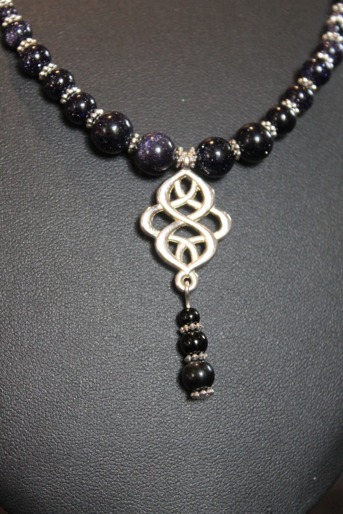 Blue Sandstone Knot Necklace | Hand 